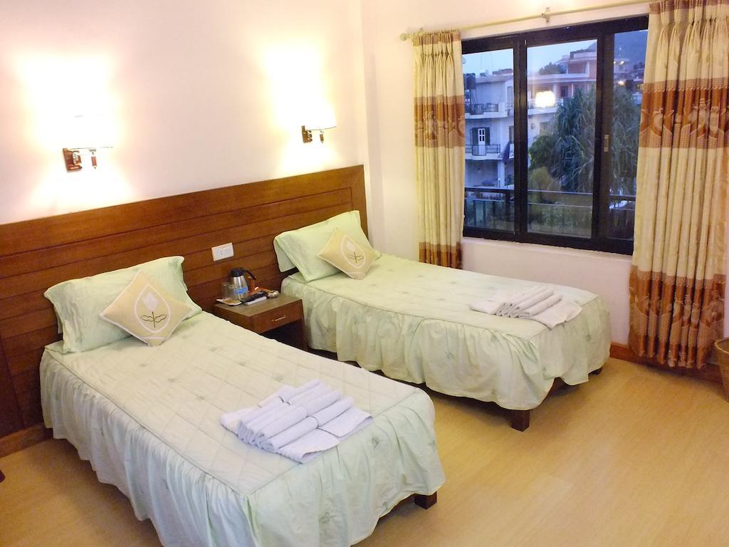 Hotel Greenland Pokhara Habitación foto